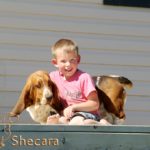 Boy with Basset Hound Puppy